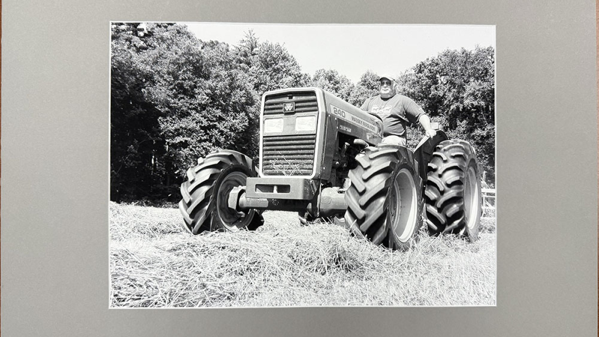 Lot 115_Tom Cross on Tractor © Robert Floyd; 16” X 20”; $150