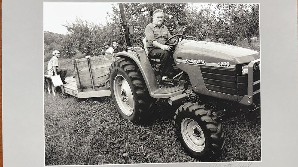 Lot 116_Tom Bashista on Tractor © Robert Floyd; 16” X 20”; $150