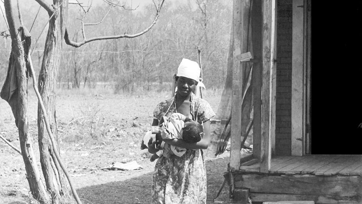 Woman Nursing bay © 1966 Julius Lester, Black South (Matted and Framed) Only $475